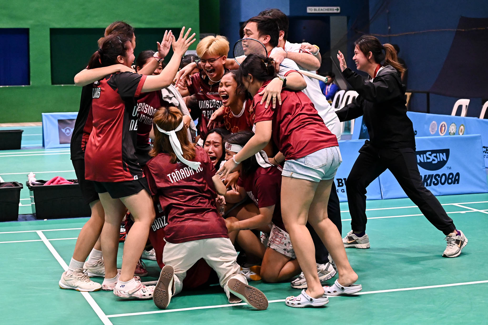 QUEENS AGAIN. UP women's badminton snaps five-season drought in dramatic fashion over Ateneo.
Photo: UAAP Season 87 Media UP celebrates winning the school's 10th UAAP championship